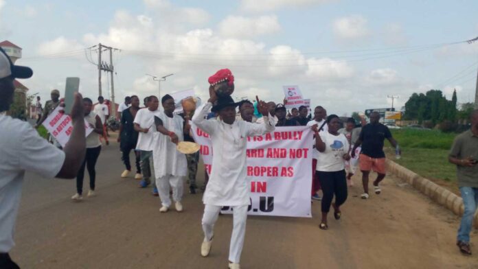 Youths in Asaba protest against employment policy in Dennis Osadebay University