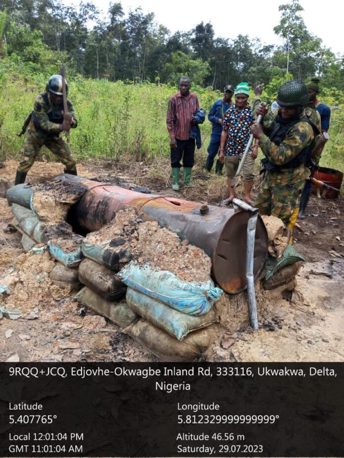 Military troops destroy illegal refining site in Ughelli, Delta State