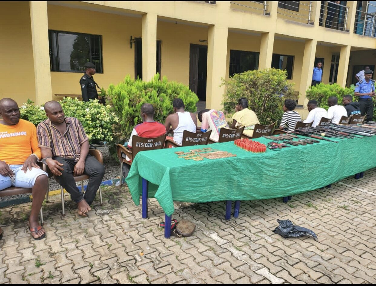 recovered arms and ammunition, paraded suspects